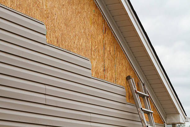 Professional Siding technician working in Tyrone, PA